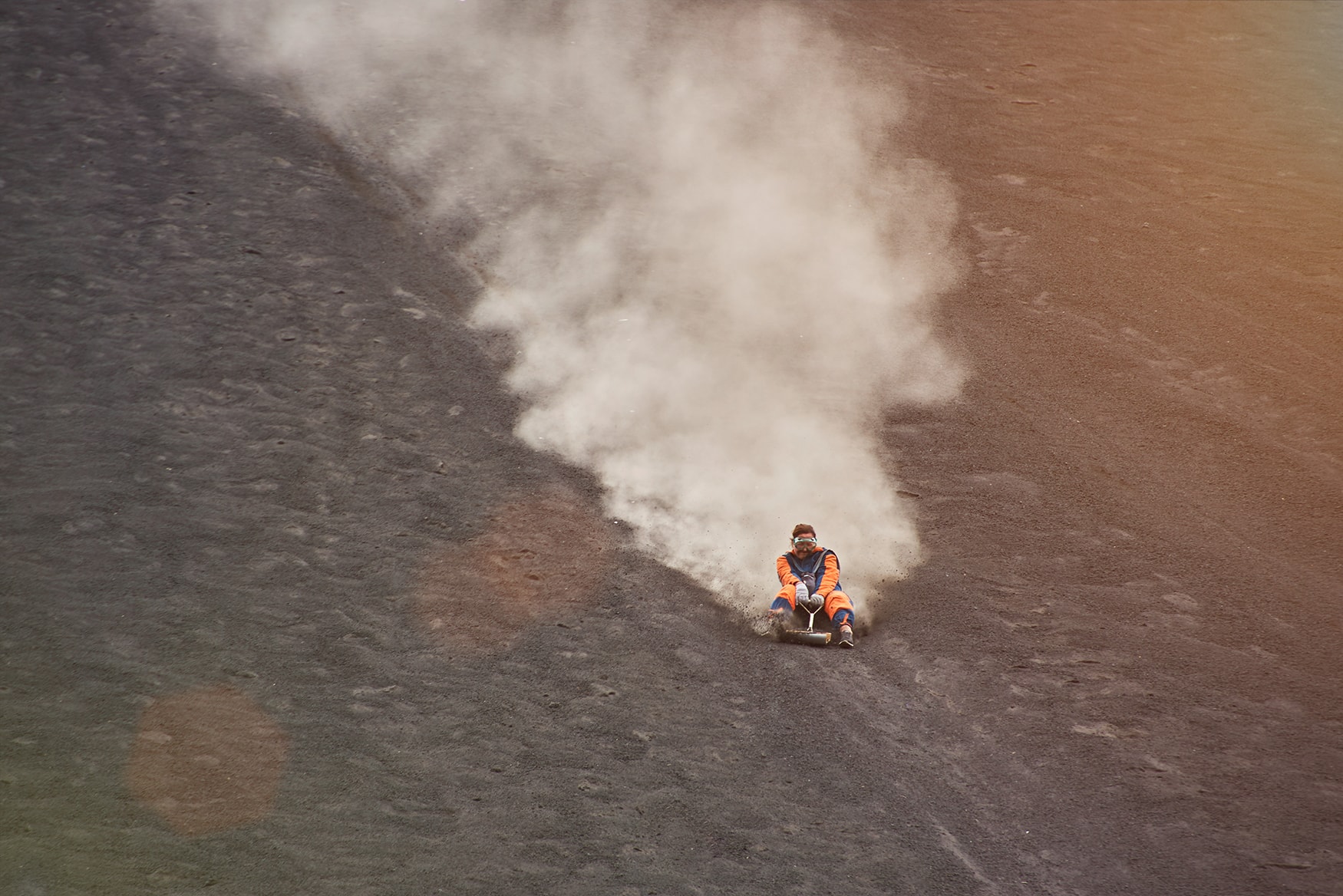Frau beim Volcano Boarding auf demCerro Negro