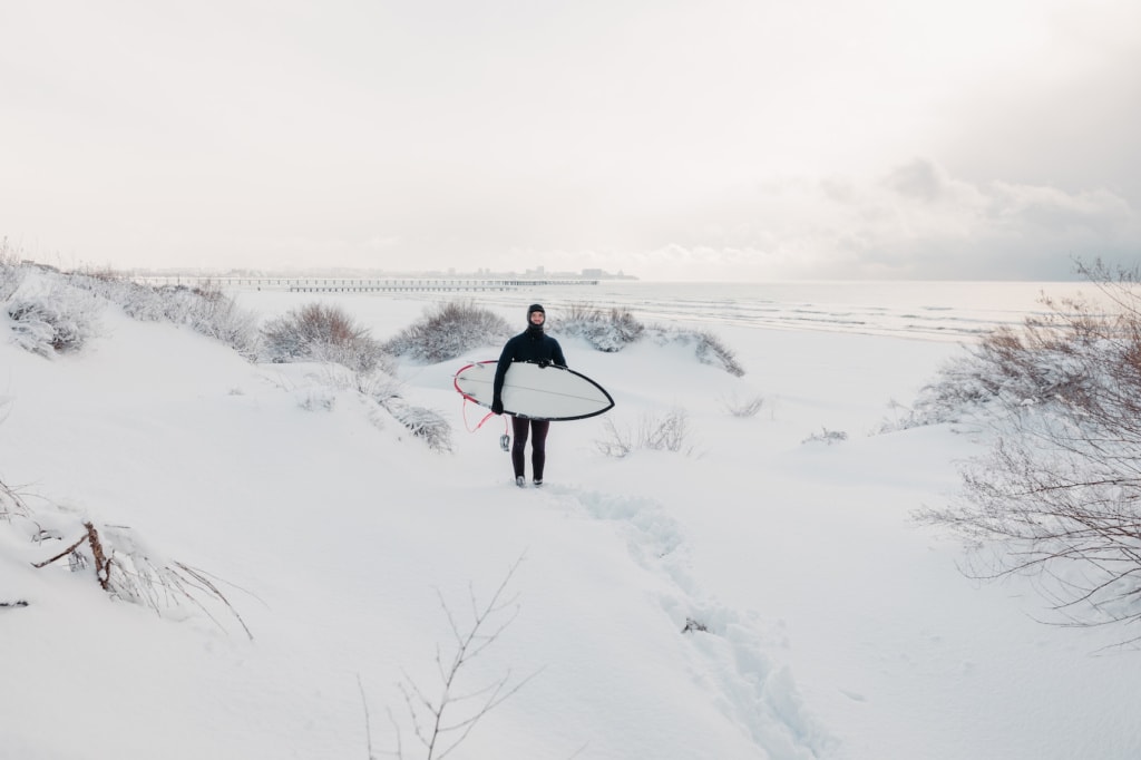 Bei minus 13 Grad Wassertemperatur sollte der Neoprenanzug warm sein!