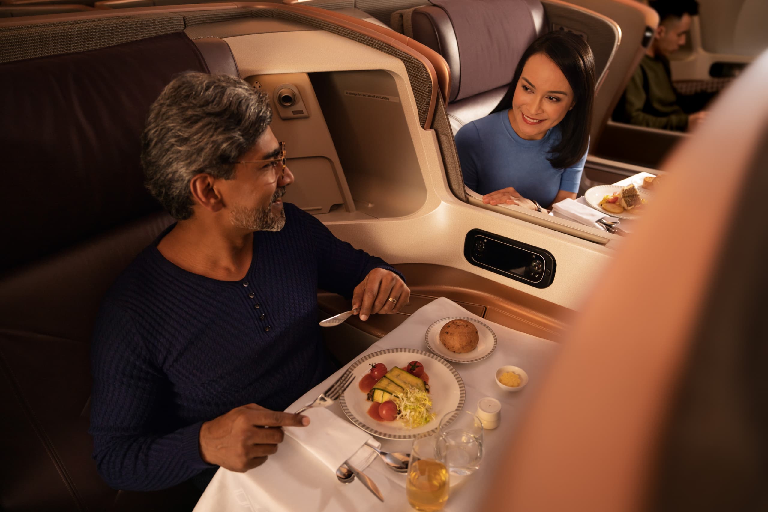 Paar an Bord von Singapore Airlines