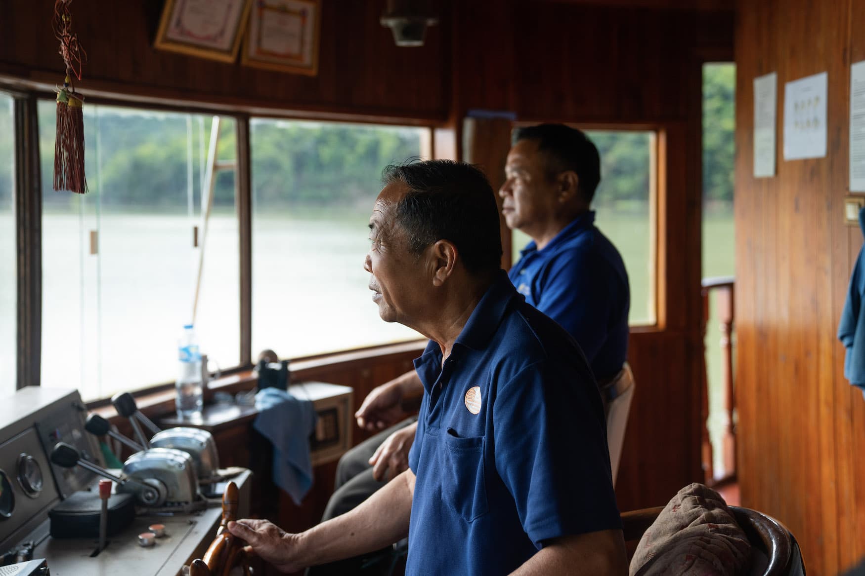 Captain einer Flusskreuzfahrt in Laos