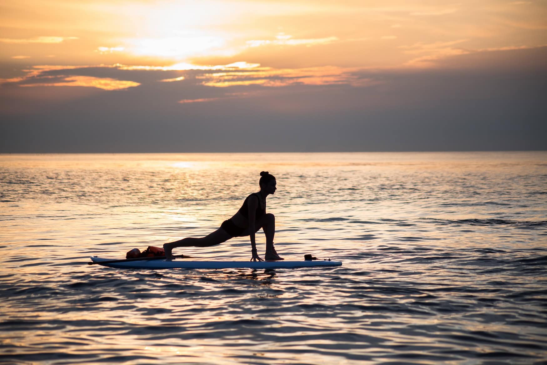 Yoga auf einem SUP