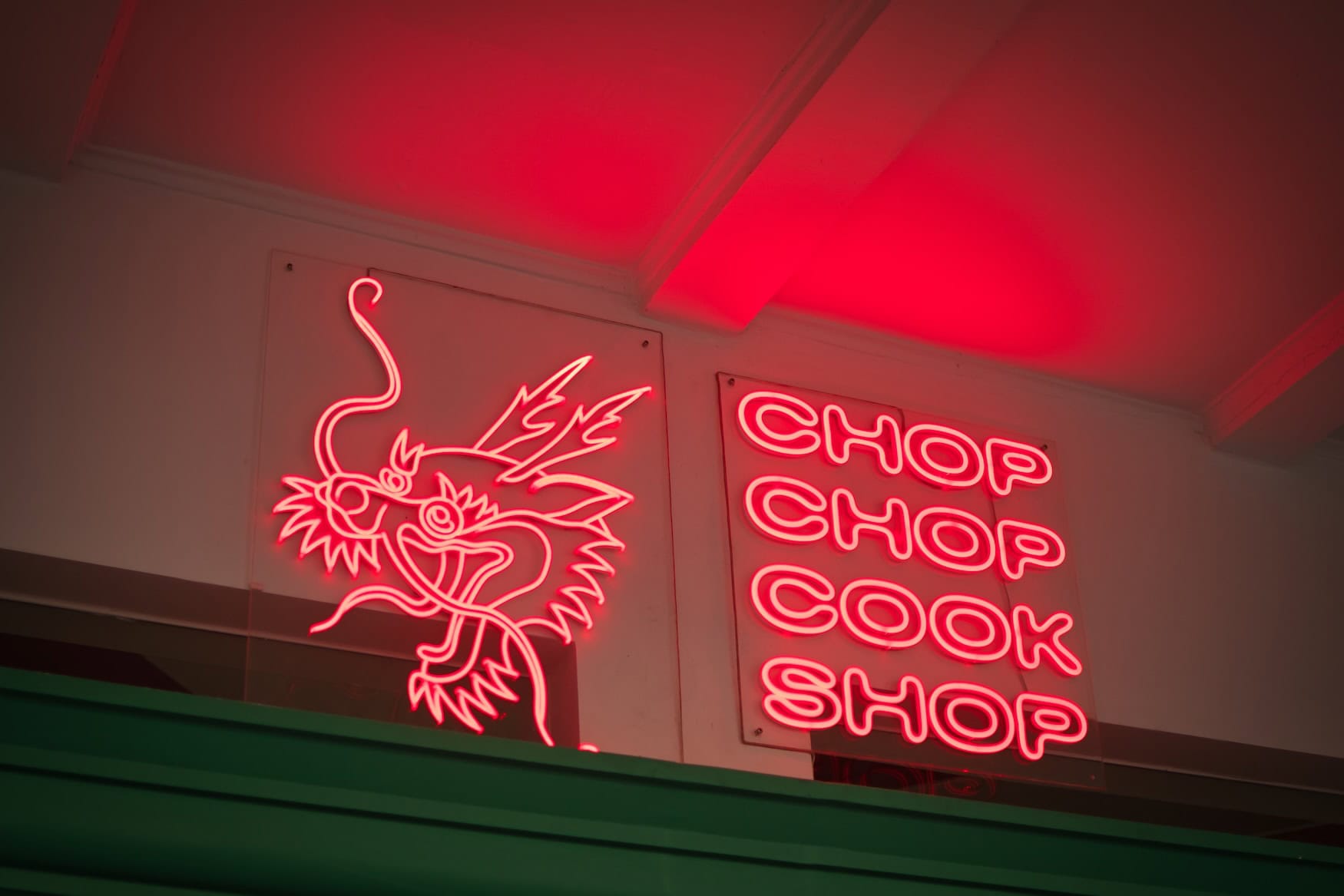 Das Schild von Chop Chop Cook Shop in Bangkok.