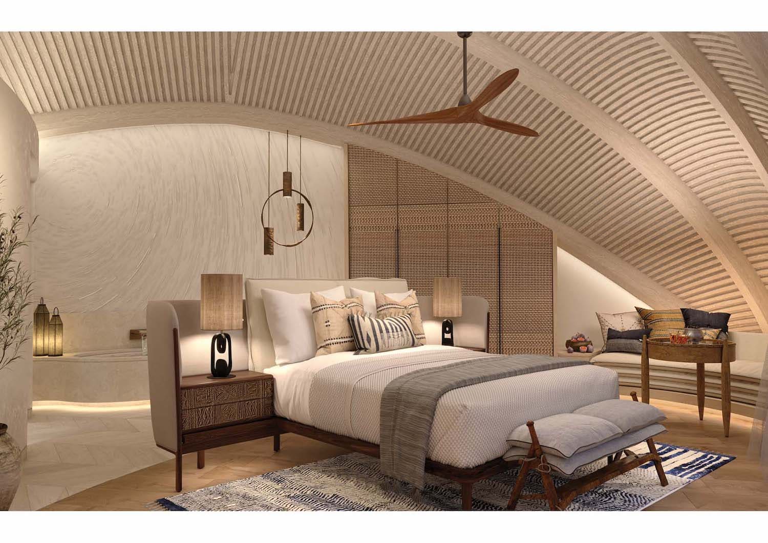 Nujuma Ritz Carlton: Zimmer mit gebogener Decke in hellen Farben mit weiß, beige und hellgrau und vereinzelten arabischen Elementen