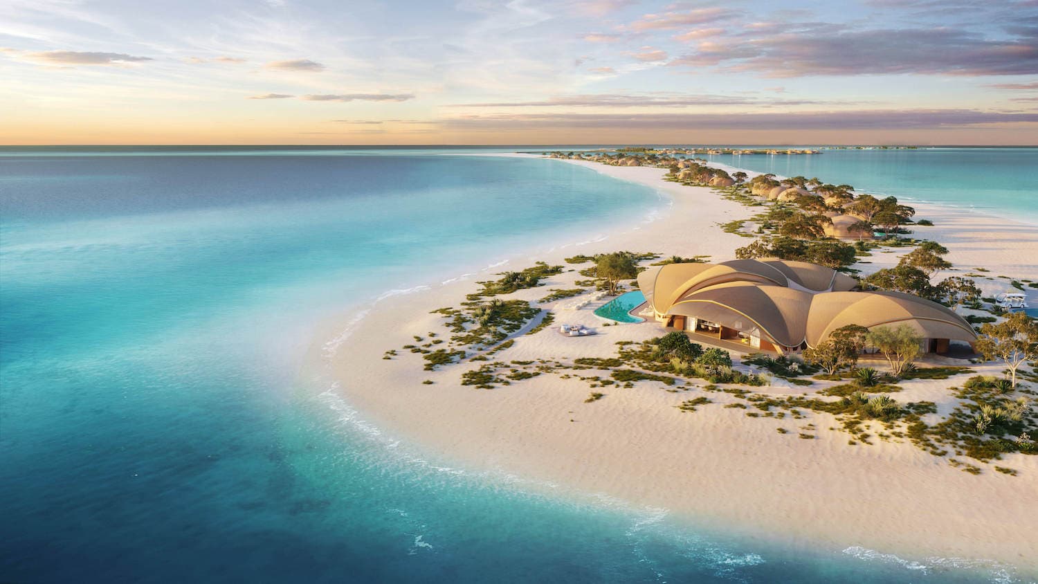 Nujuma, A Ritz Carlton: Luftaufnahme der Insel inmitten von türkisfarbenen Meer und weißen Sandstrand