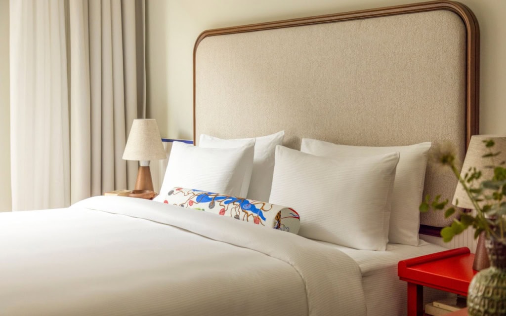 Bett im Deluxe Studio im Hotel Miiro Spittelberg