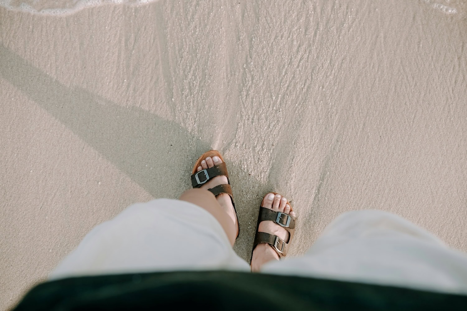 Schlappen im Sand