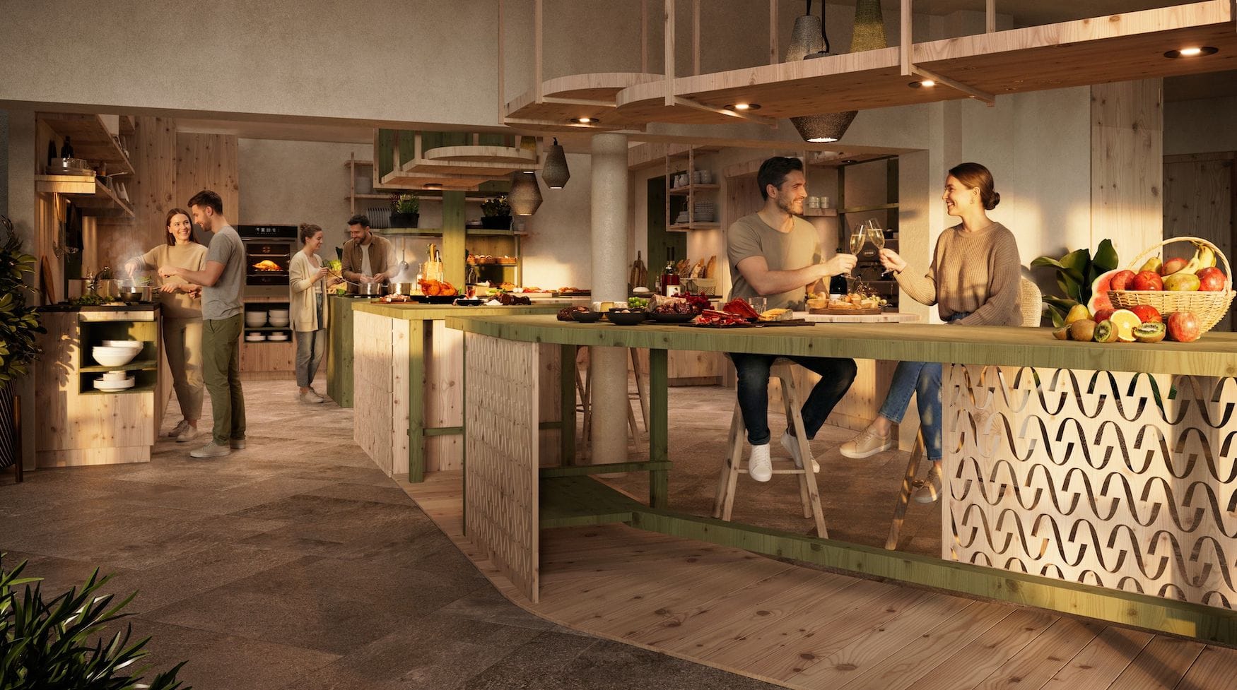 Gäste kochen und essen gemeinsam in der Community Kitchen des Hotel Aui in Meransen