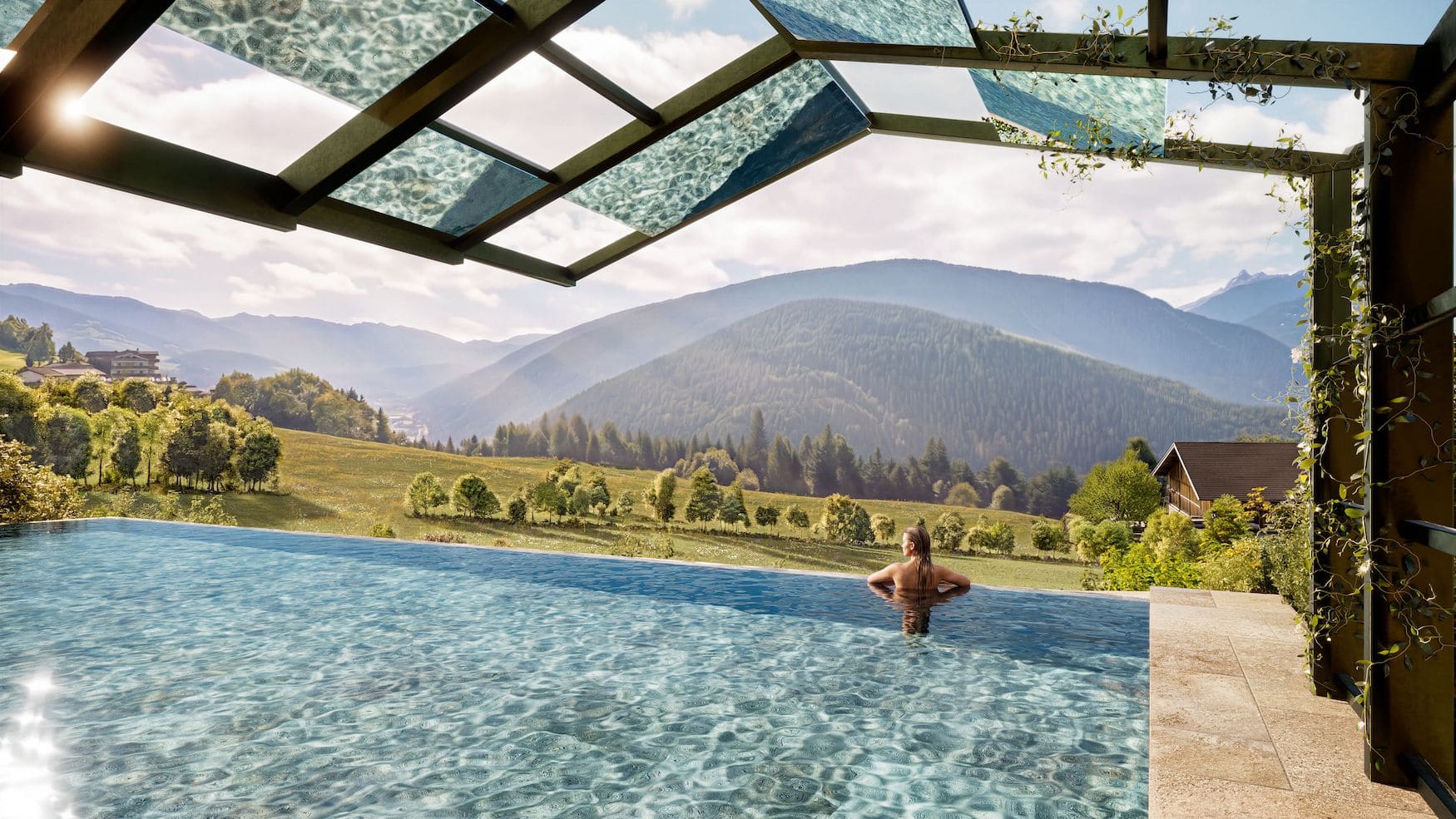 Beheizter Infinity-Outdoorpool des Hotel Aui mit Blick auf die Berge Südtirols
