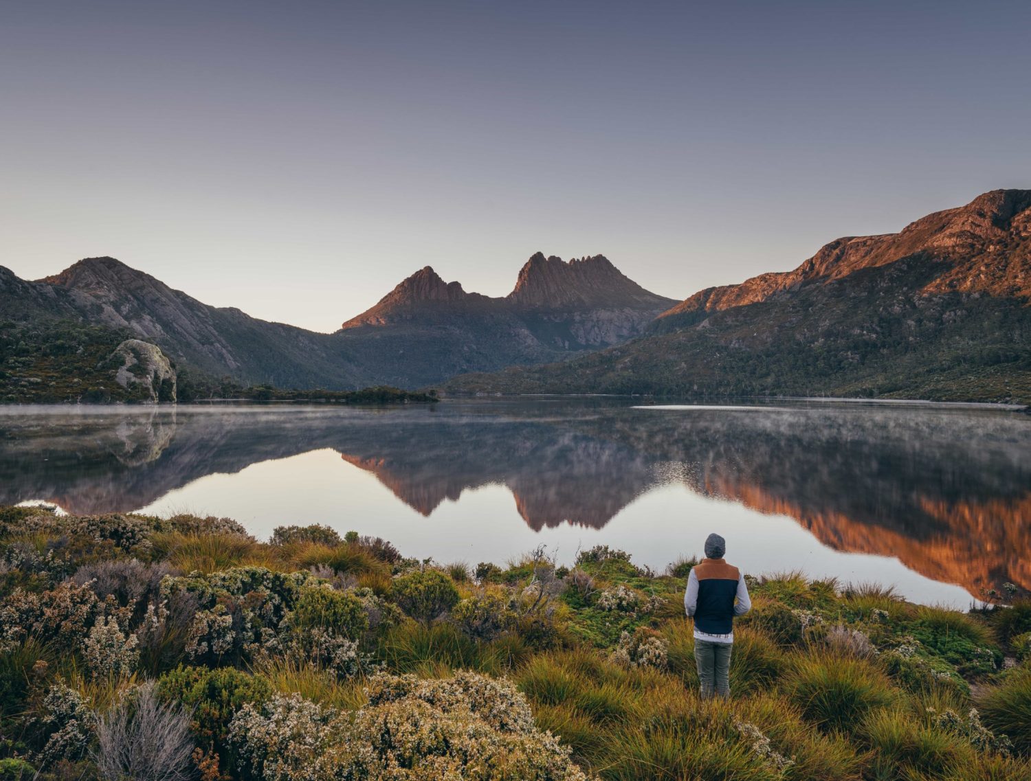 Cradle Mountain forms the northern end of the wild Cradle Mt - Lake St Clair National Park, itself a part of the Tasmanian Wilderness World Heritage Area. The jagged contours of Cradle Mountain epitomise the feel of a wild landscape, while ancient rainforest and alpine heathlands, buttongrass and stands of colourful deciduous beech provide a range of environments to explore.